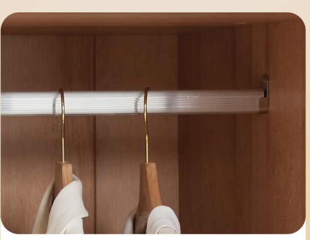 Metal clothes rail mounted in the wardrobe
