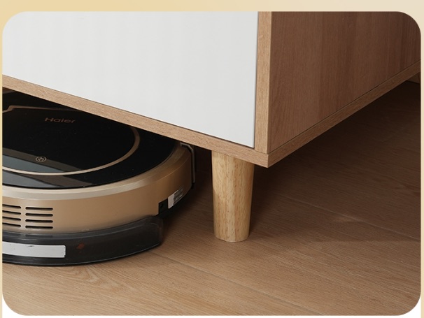 Wardrobe raised above a robotic vacuum